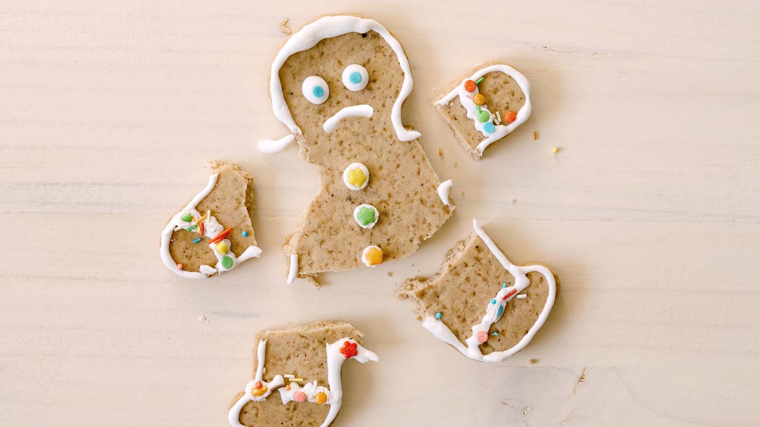 Broken holiday cookie frowning