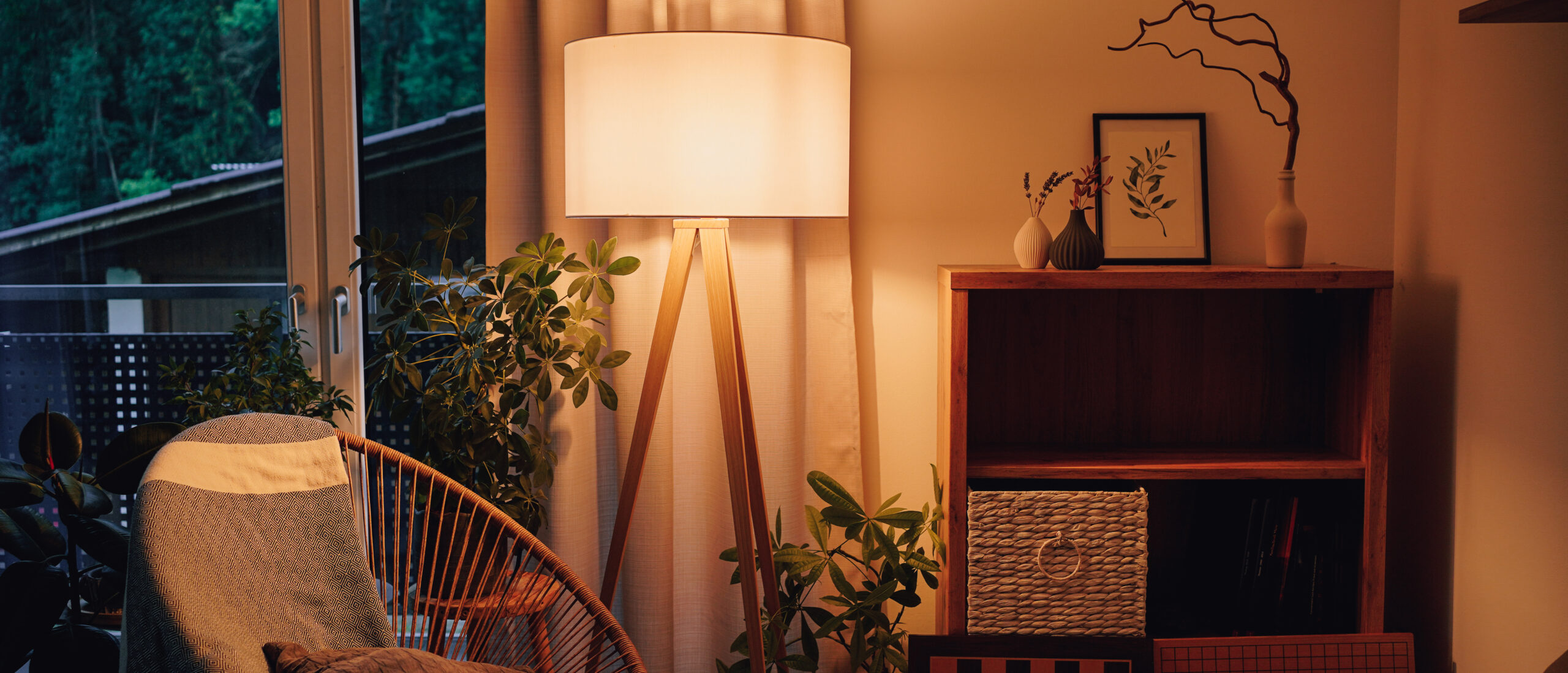Lamp illuminating a decorative living room with warm light