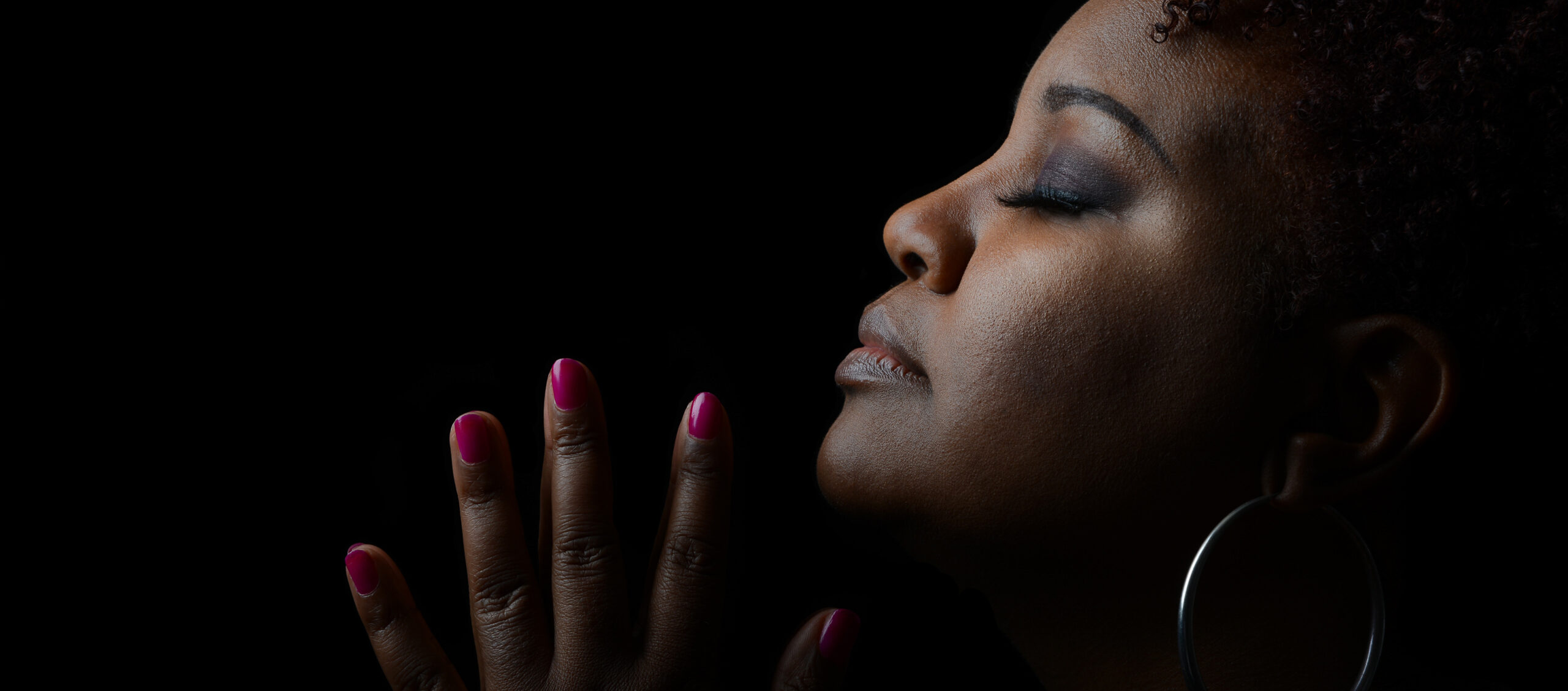 Very Nice Emotional Image of a beautiful Afro American Woman giving Thanks